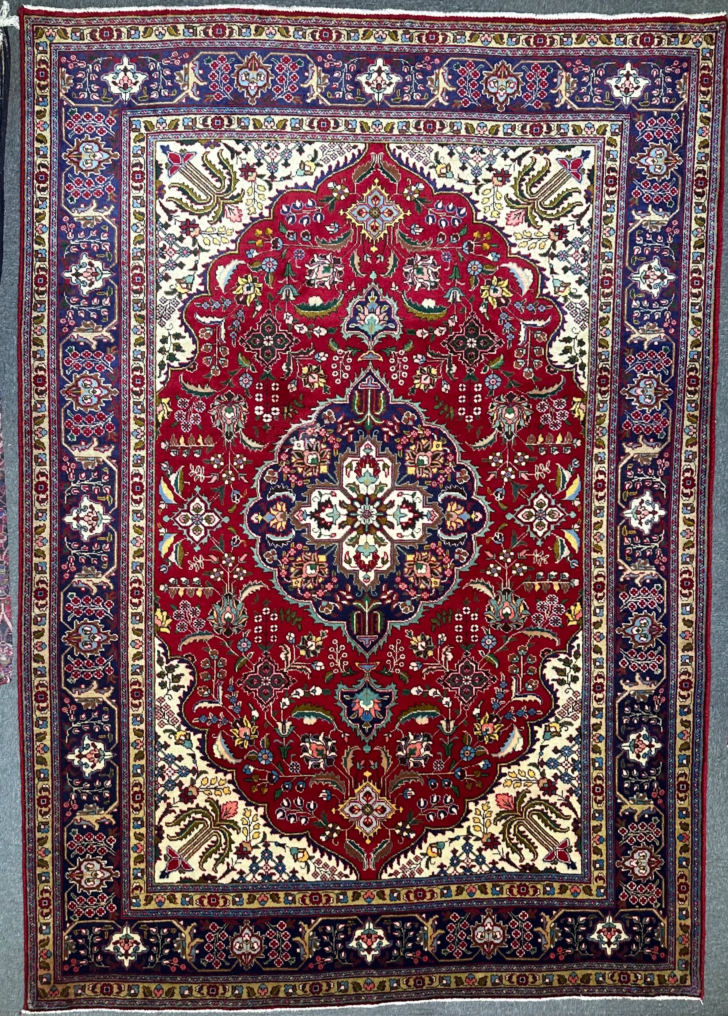 Persian Tabriz Hand Knotted Wool pile rug from Iran