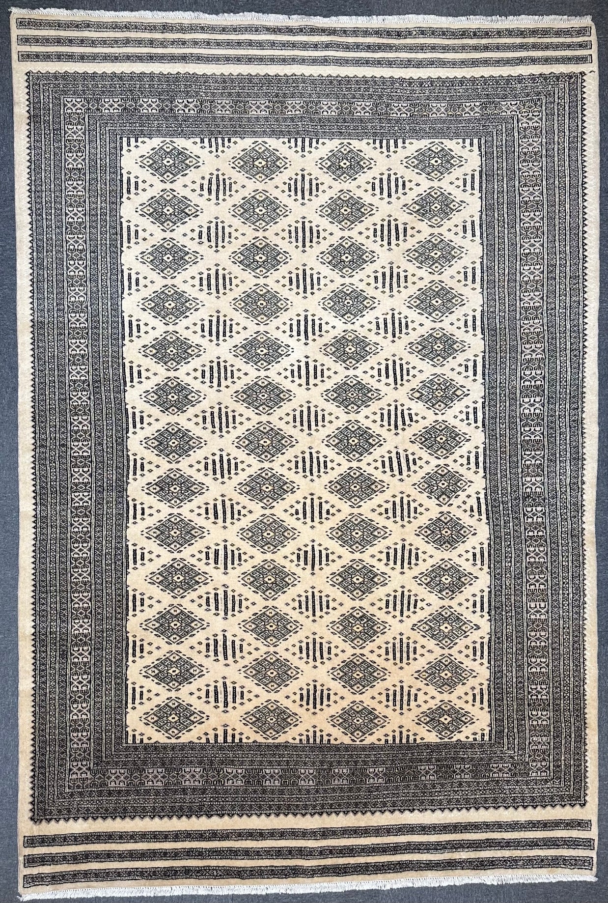 Fine Kashmiri Hand Knotted wool pile with silk highlights