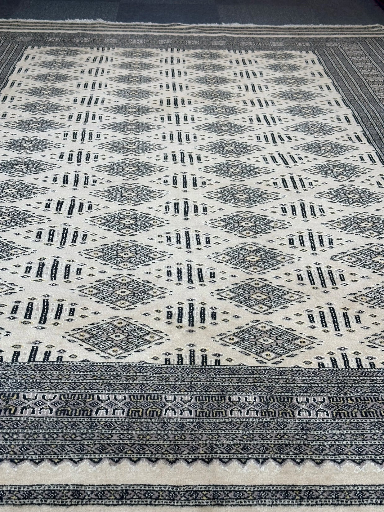 Fine Kashmiri Hand Knotted wool pile with silk highlights