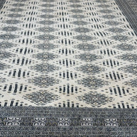 Fine Kashmiri Hand Knotted wool pile with silk highlights